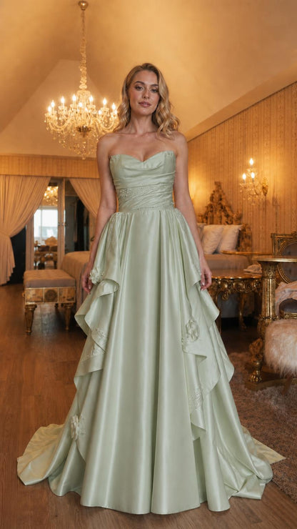 Front view of sage green strapless evening gown