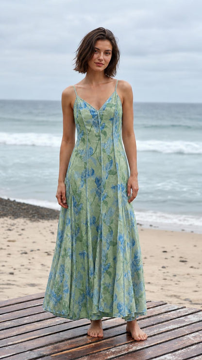 Front view of the sage green floral maxi slip dress