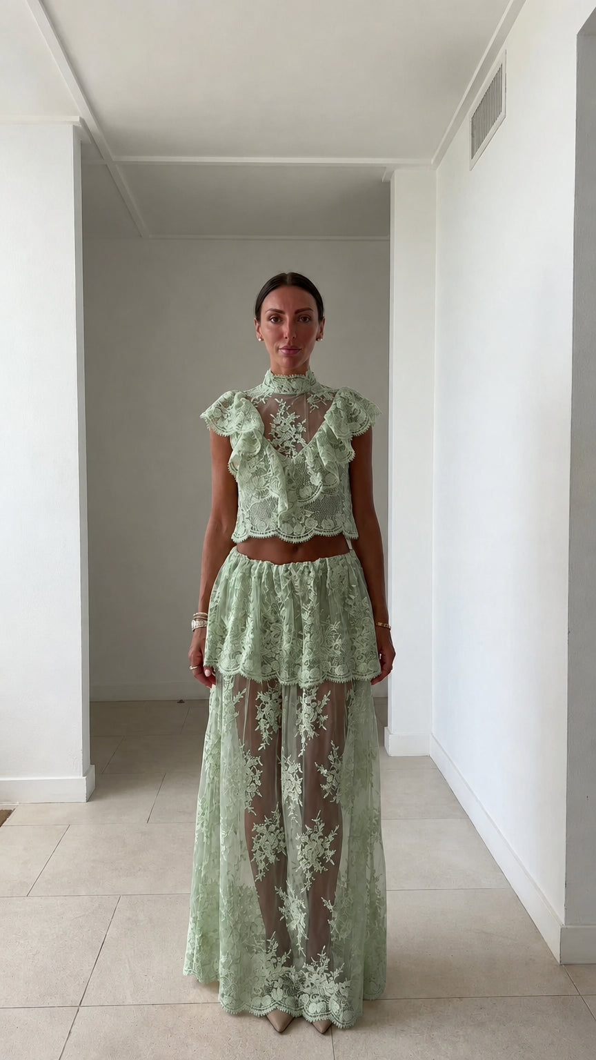 Model wearing sage green lace two-piece set