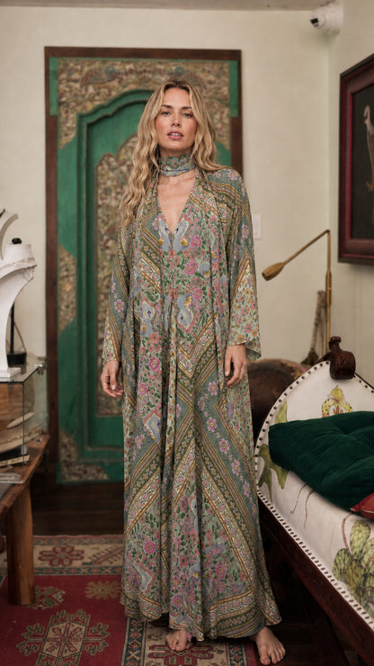 Model wearing sage bohemian floral maxi dress