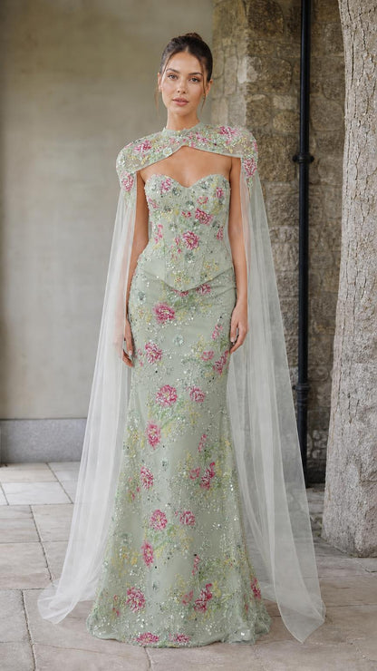 Front view of sage green floral embroidered corset gown with sheer cape