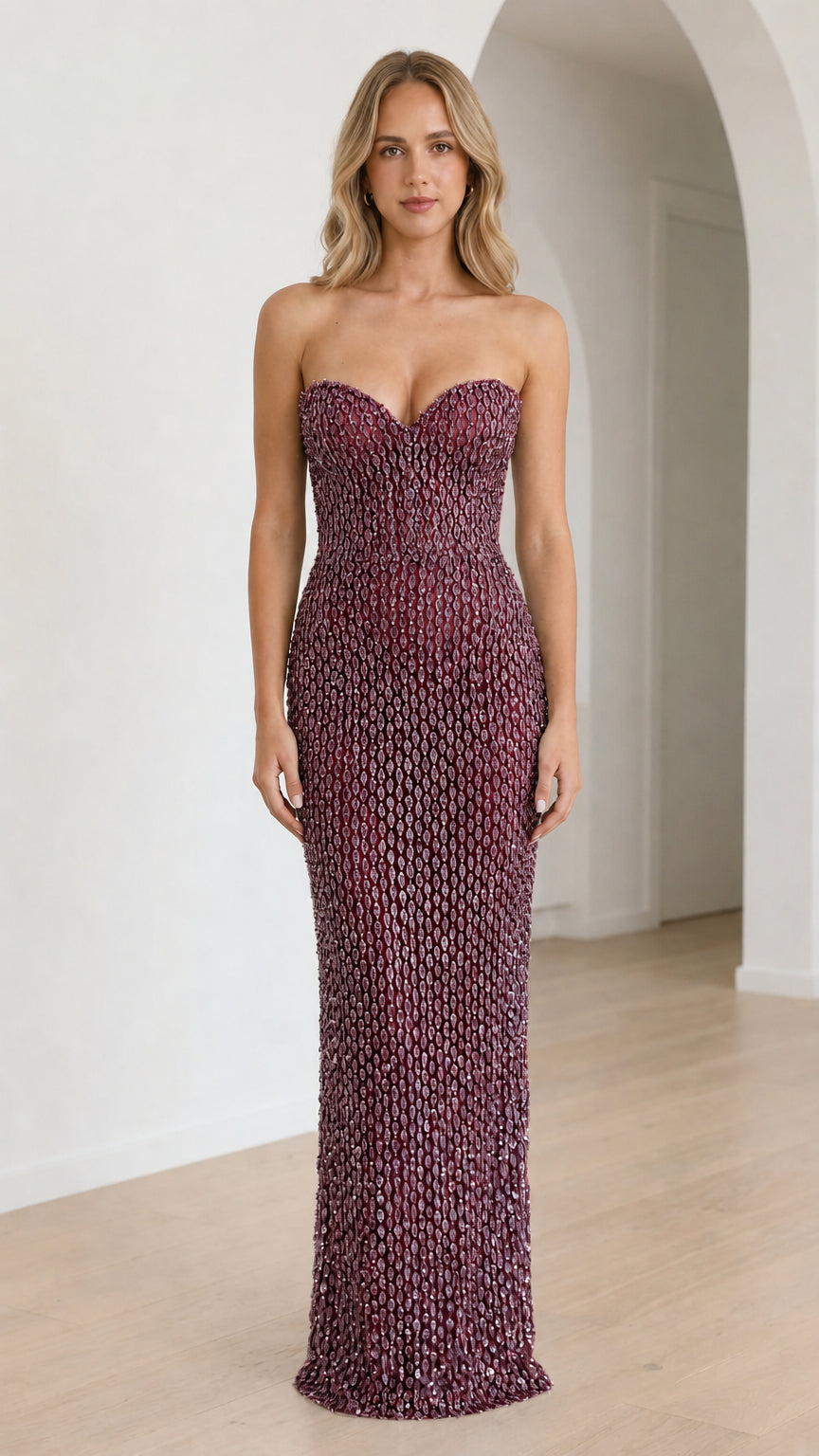 Front view of burgundy sequin strapless maxi dress