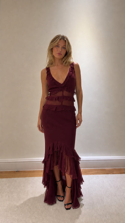 Burgundy ruffled tiered maxi dress on model