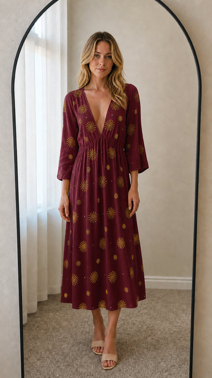 Front view of burgundy embroidered midi dress