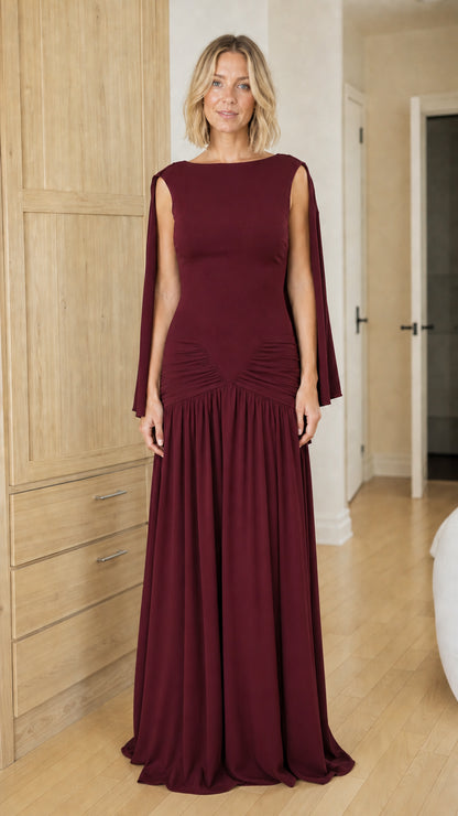 Front view of woman wearing deep burgundy formal evening dress