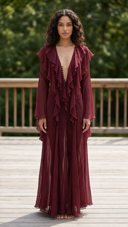 Model wearing burgundy ruffle maxi dress