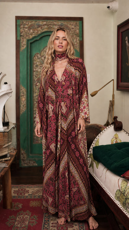 Model wearing burgundy bohemian floral maxi dress