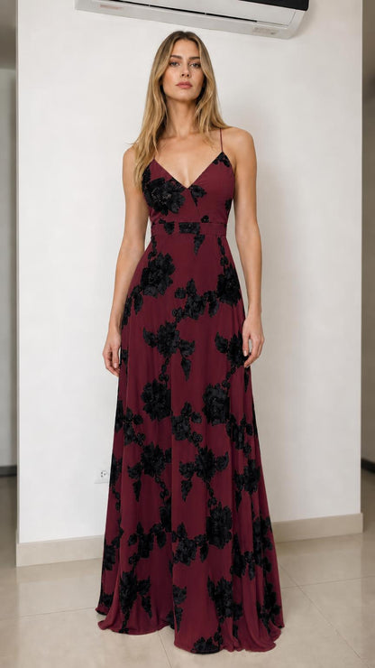 Front view of burgundy floral applique maxi dress