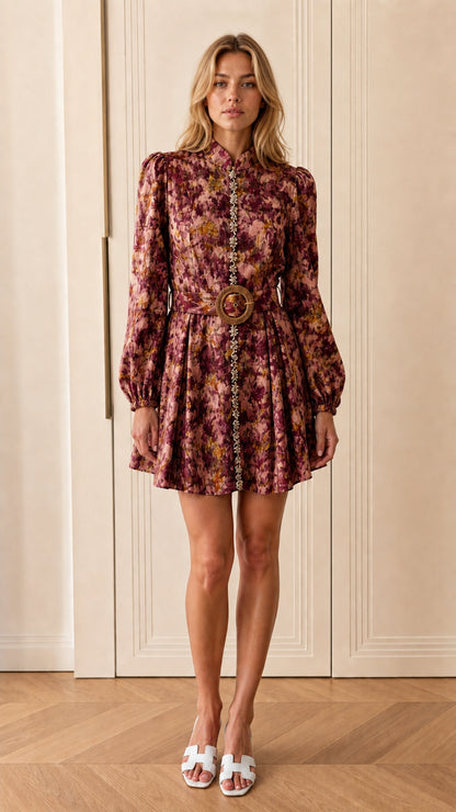 Model wearing burgundy printed long-sleeve mini dress