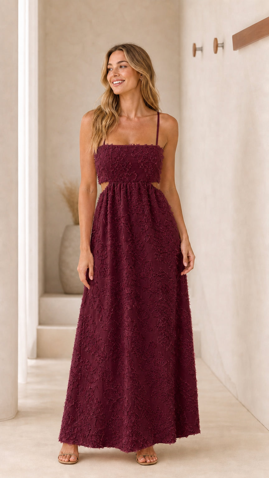 Front view of burgundy textured cutout maxi dress