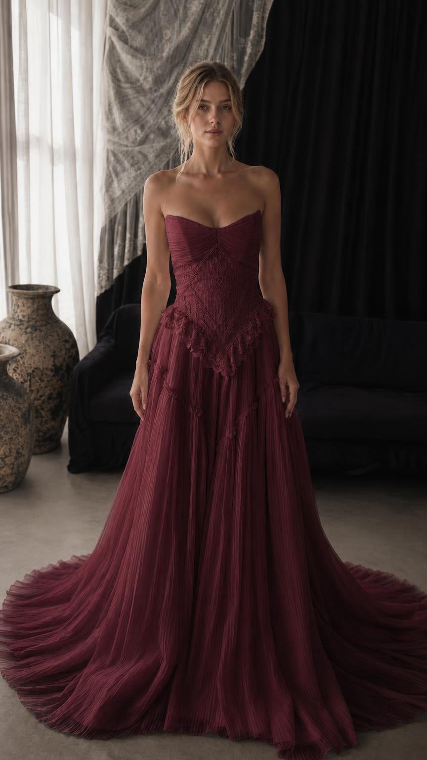 Front view of burgundy red strapless lace corset tulle evening gown