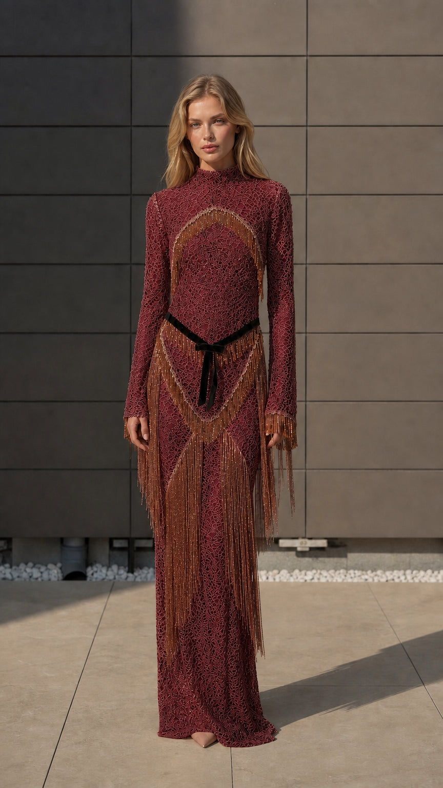 Model wearing burgundy metallic crochet fringe maxi dress