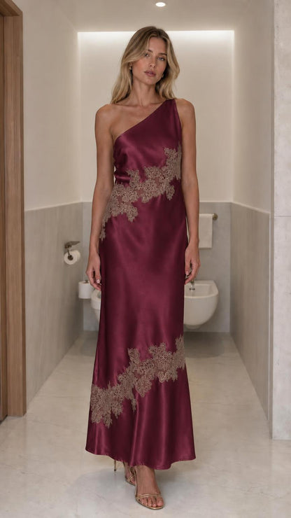 Model wearing burgundy one-shoulder satin lace maxi dress