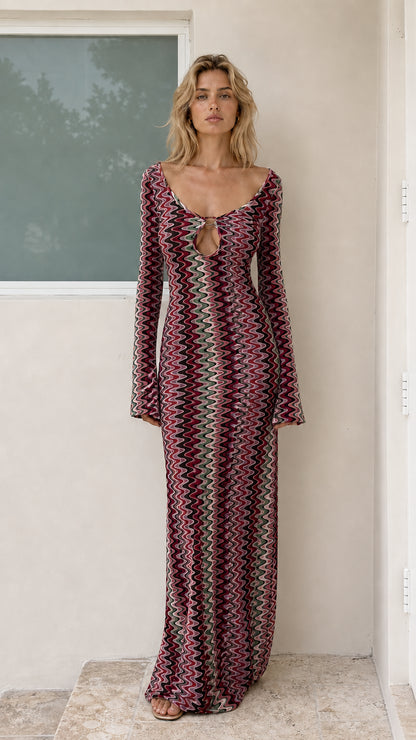 Model wearing Burgundy variant of chevron knit maxi dress