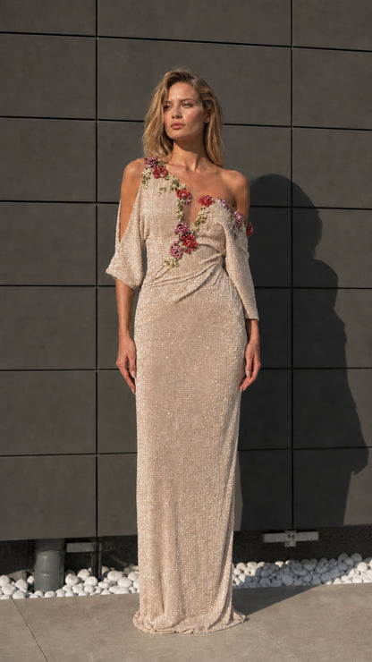 Front view of champagne one-shoulder beaded evening dress