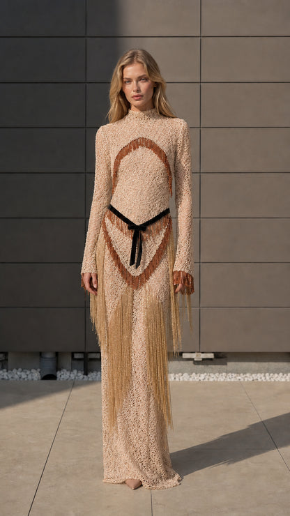 Model wearing beige metallic crochet fringe maxi dress
