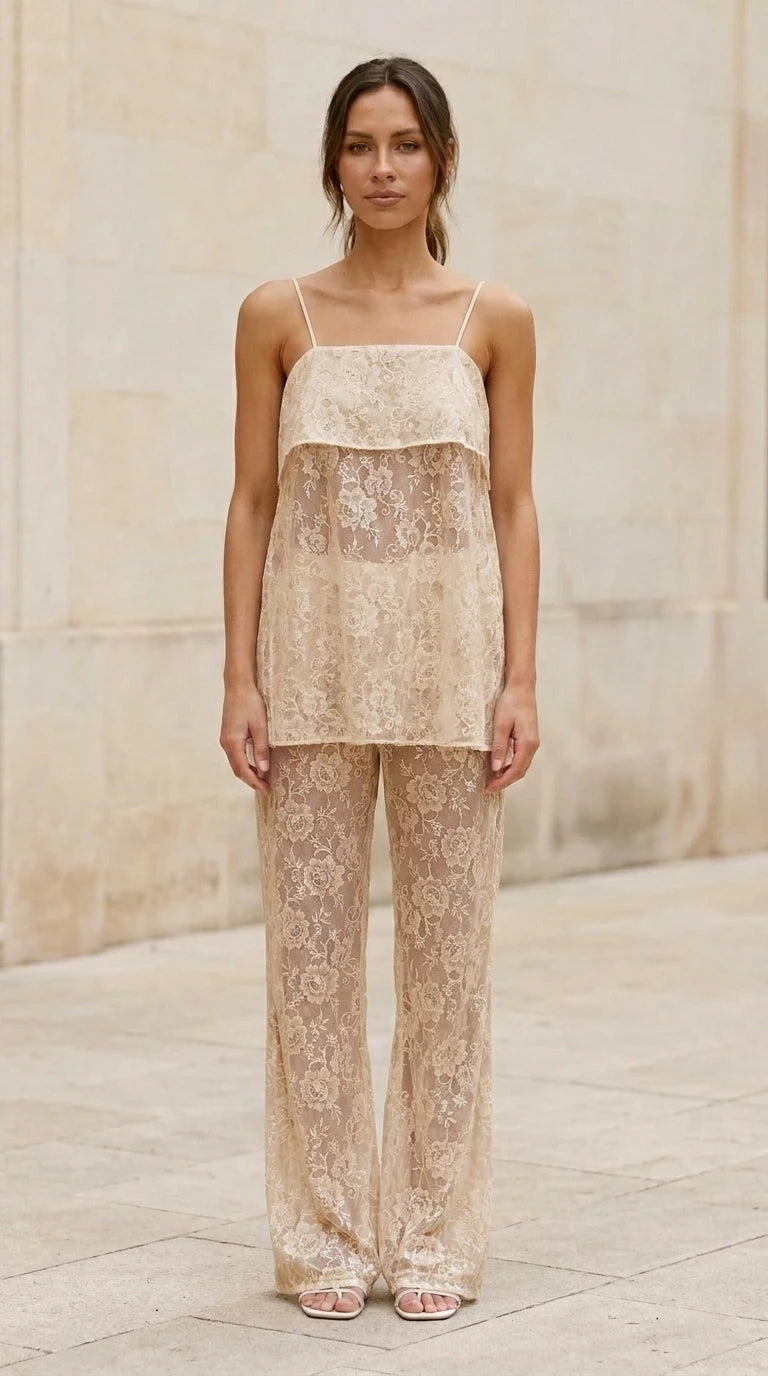Model wearing champagne lace cami top and matching pants
