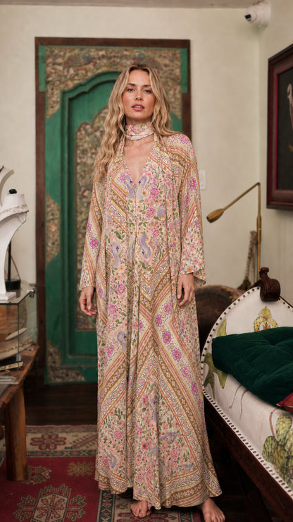 Model wearing beige bohemian floral maxi dress