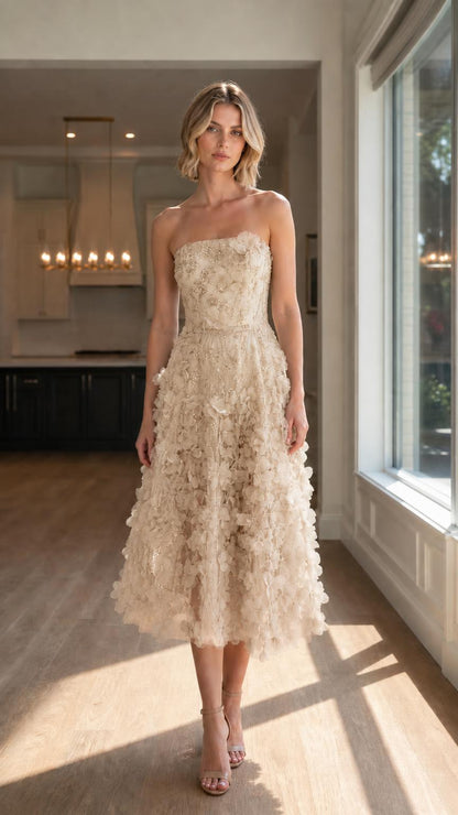 Front view of champagne strapless 3D floral midi dress