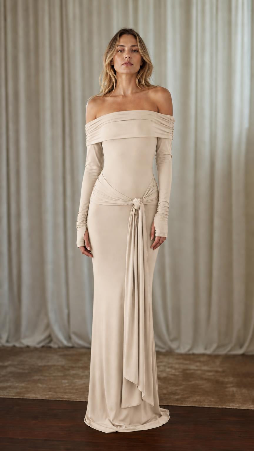 Front view of woman wearing beige off-shoulder maxi dress