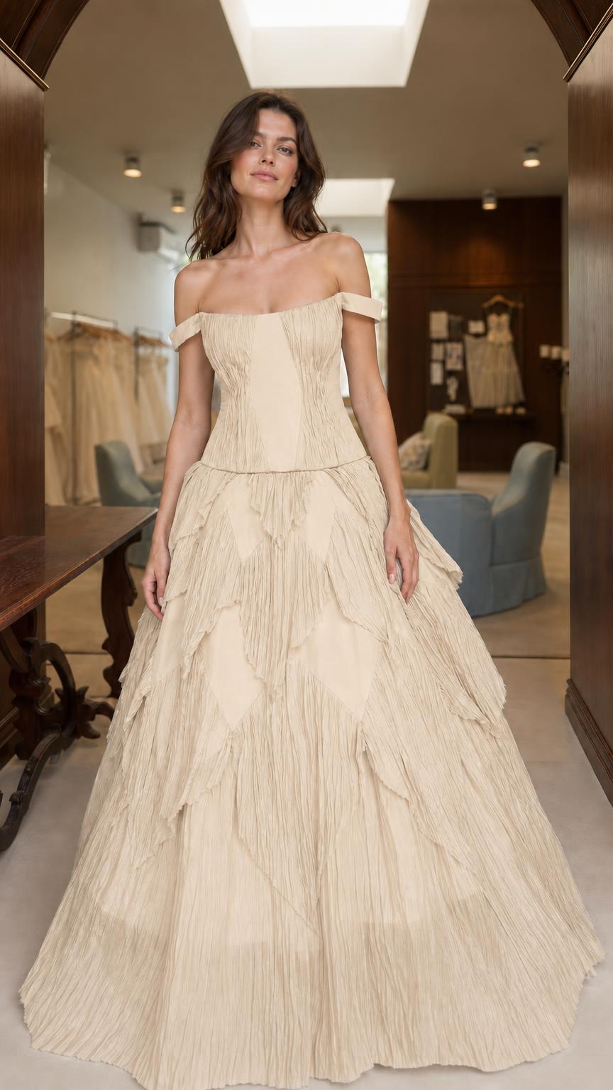 Front view of champagne off-the-shoulder evening ball gown